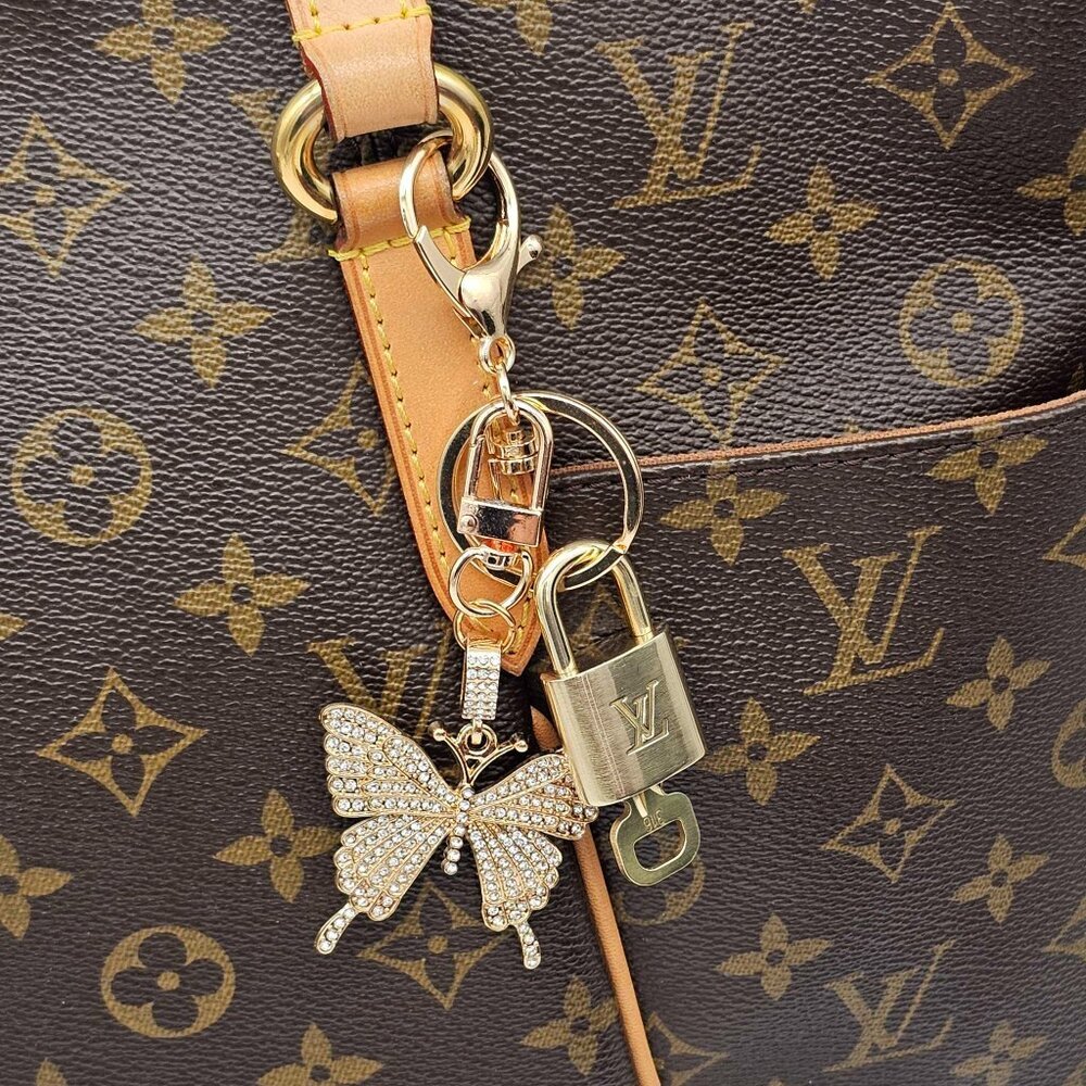 Louis Vuitton Authentic Gold Lock 🔒 Unbranded Butterfly Keychain for Bags
